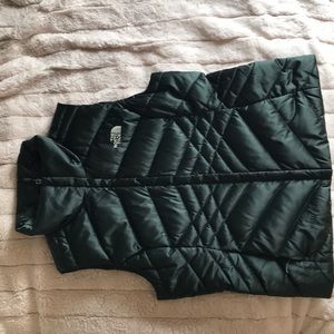 Dark emerald green north face vest. Medium.